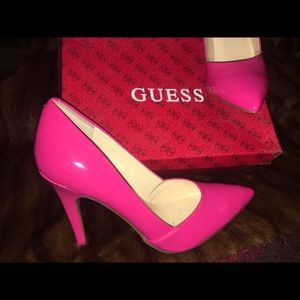 Guess Patent Pumps